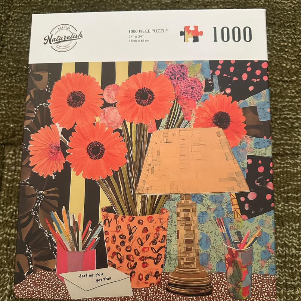 1000 Piece Puzzle with Orange Floral Design